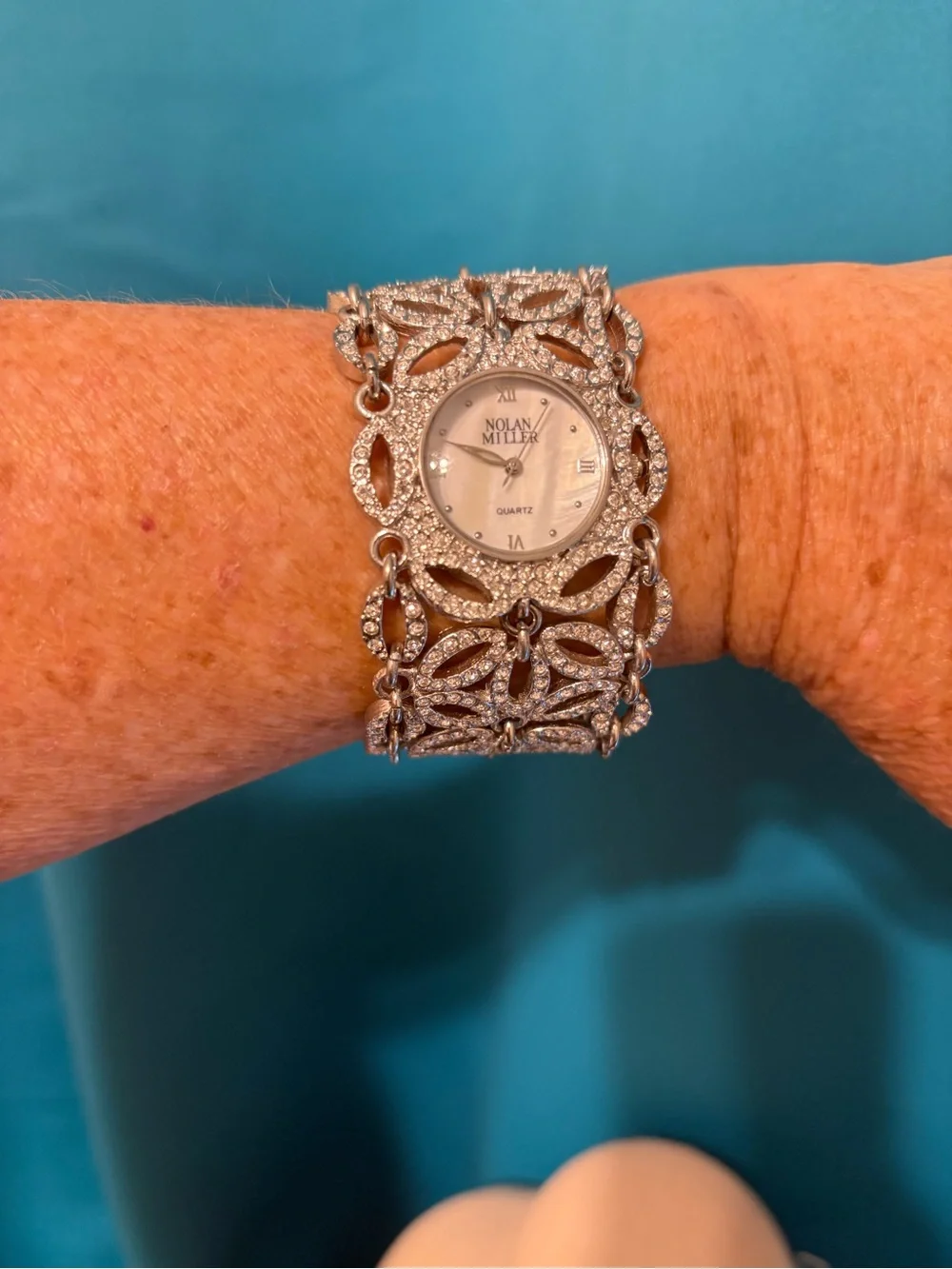 nolan miller watch stunning  silver tone rhinestone floral 7.5” needs battery